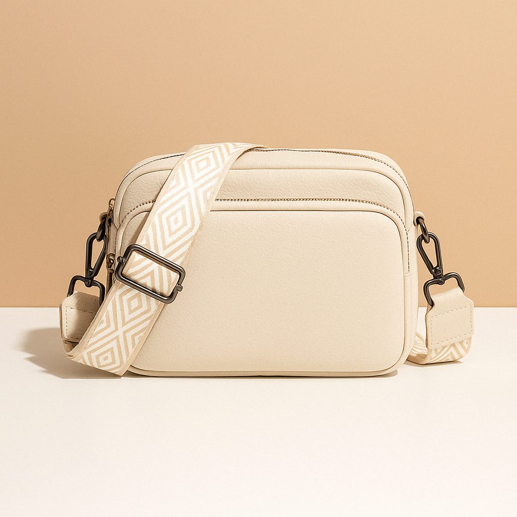 Women’s chic leather crossbody bag in PU with zippered compartments and water-resistant finish, perfect for elegant everyday wear.