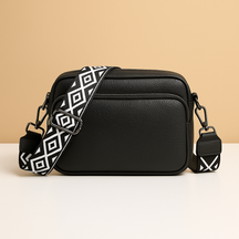 Women’s chic leather crossbody bag in PU with zippered compartments and water-resistant finish, perfect for elegant everyday wear.