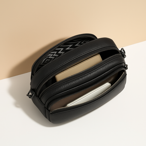 Women’s chic leather crossbody bag in PU with zippered compartments and water-resistant finish, perfect for elegant everyday wear.