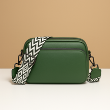 Women’s chic leather crossbody bag in PU with zippered compartments and water-resistant finish, perfect for elegant everyday wear.