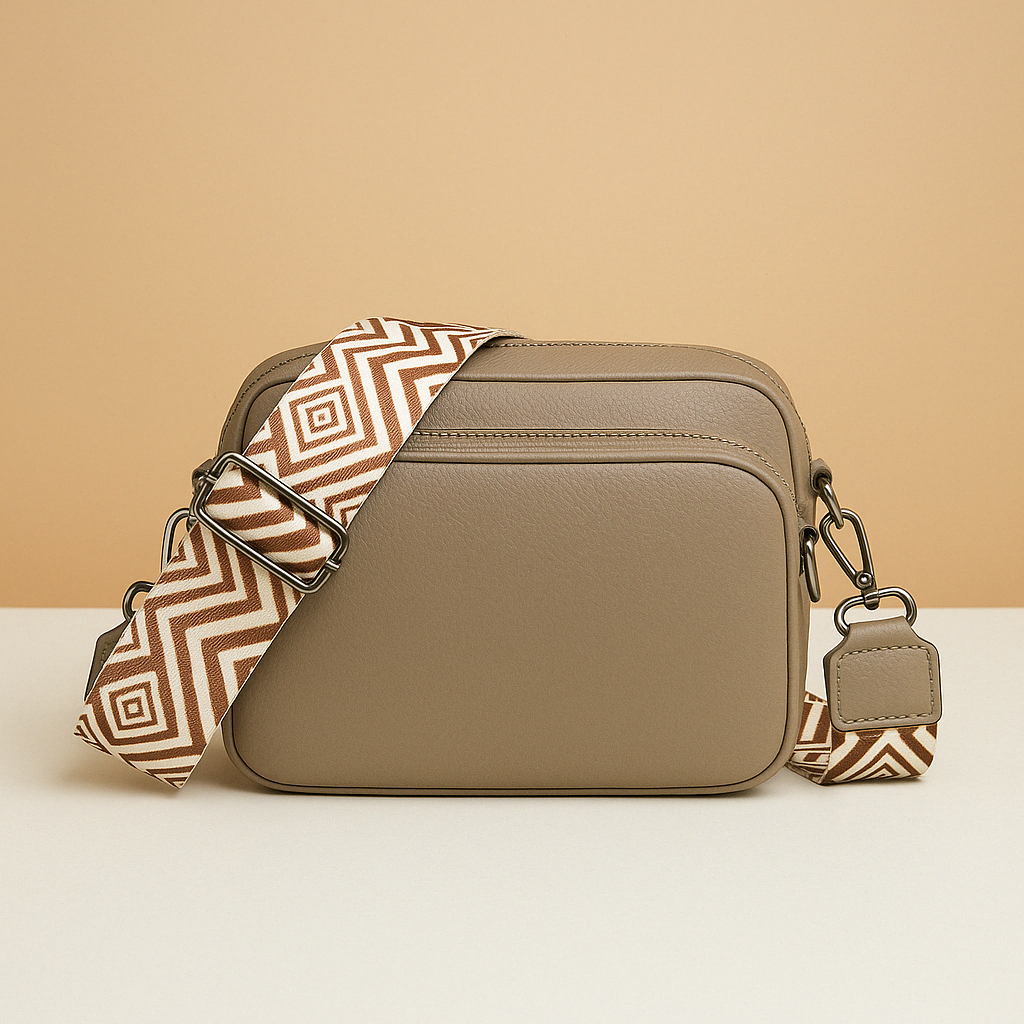 Women’s chic leather crossbody bag in PU with zippered compartments and water-resistant finish, perfect for elegant everyday wear.