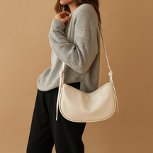 Minimalist crossbody bag for women in black, brown, or white with a sleek design and comfortable fit for daily use or events.
