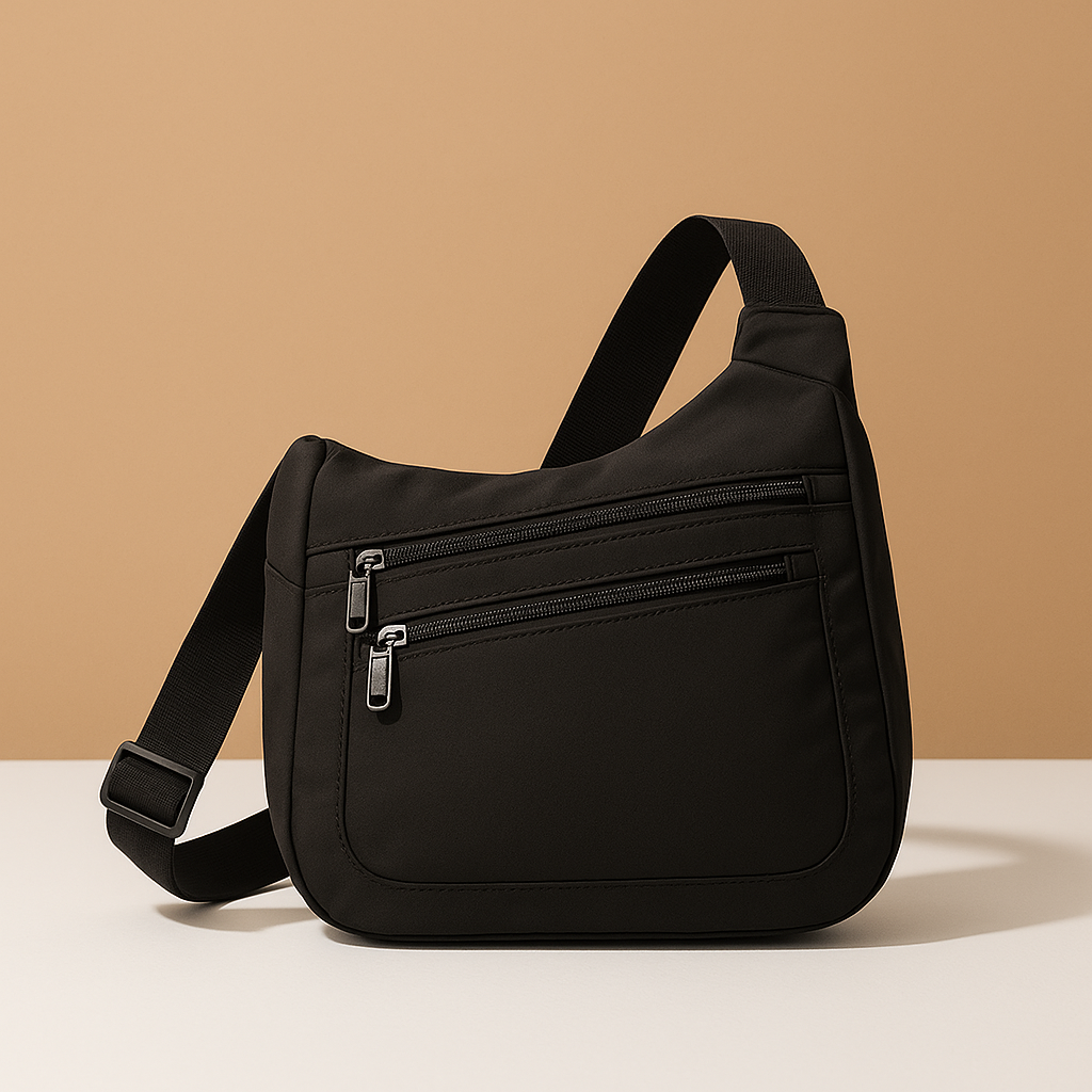 Men’s anti-theft sling bag in waterproof vegan leather with hidden compartments, zip pockets, and ergonomic padded shoulder strap.