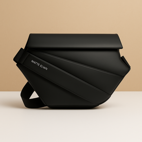 Anti-theft sling bag for men made of waterproof vegan leather with magnetic closure, zip compartments, and ergonomic strap—perfect for commuting or travel.